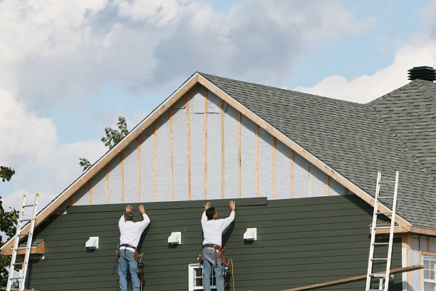 Professional Siding technician working in North Fort Myers, FL